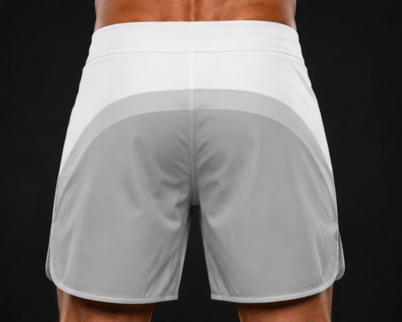 White athletic shorts with gray mesh panels on a black background